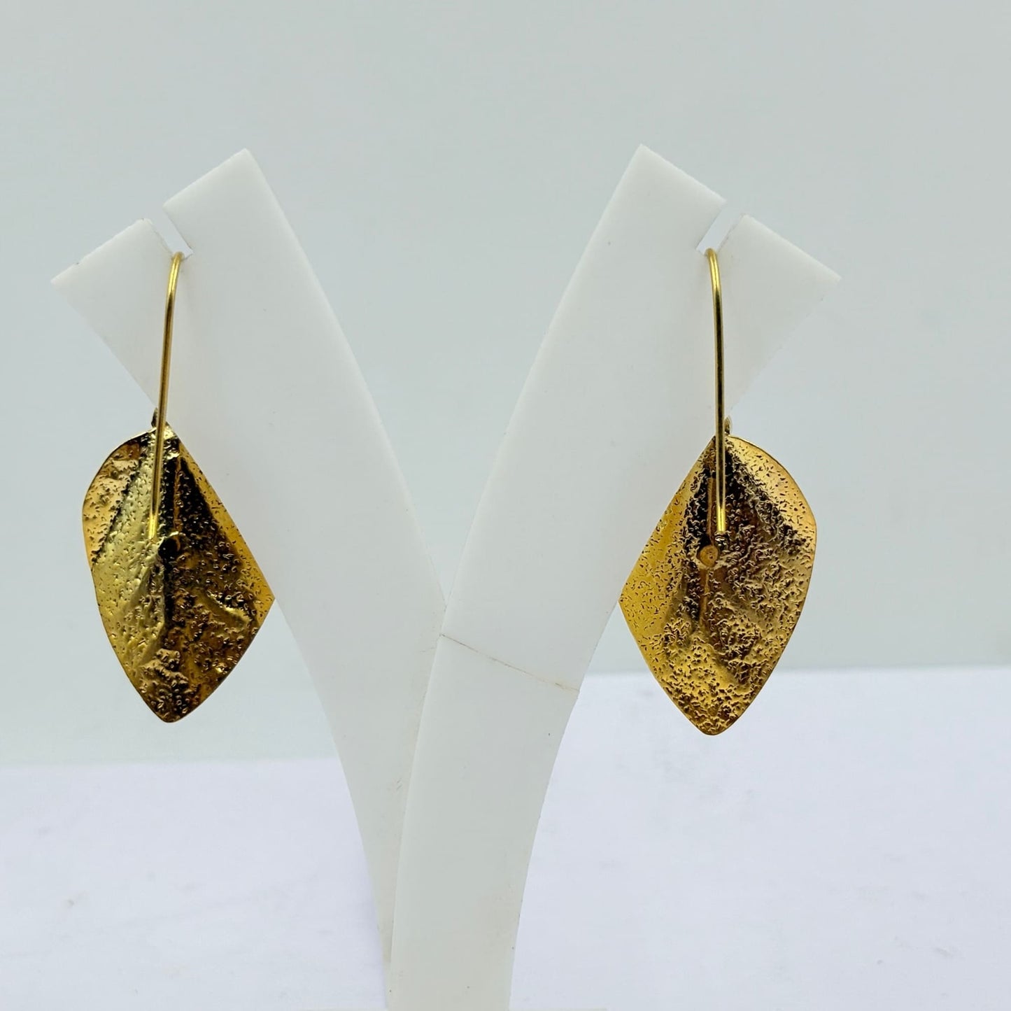 Elegant Calci Onyx Leaf Earrings with Gold Texture