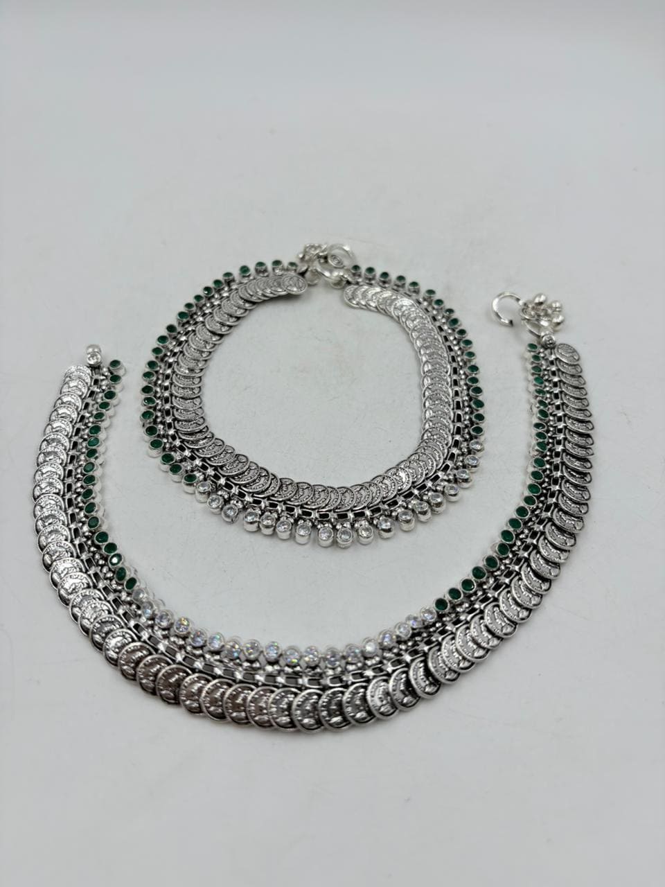 Designer Silver Anklet – Dual Layer Coin Motif with Green Stone Accents