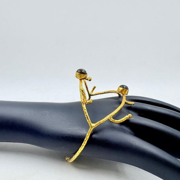 Golden Twig Black Rainbow Stone Brass Bangle