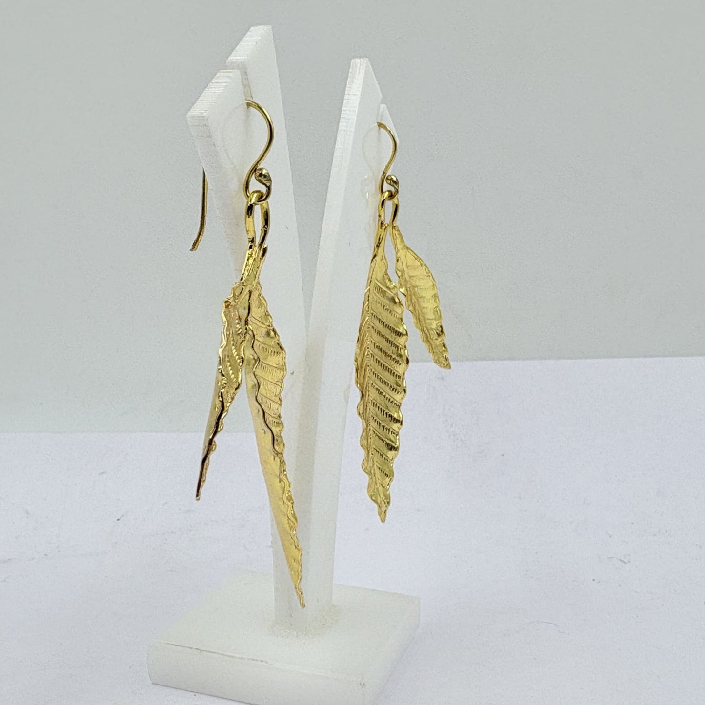 Golden Double Leaf Earrings – Nature-Inspired Elegance