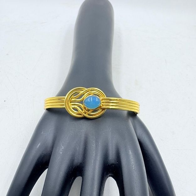 Elegant Blue Stone Knot Design Brass Bangle