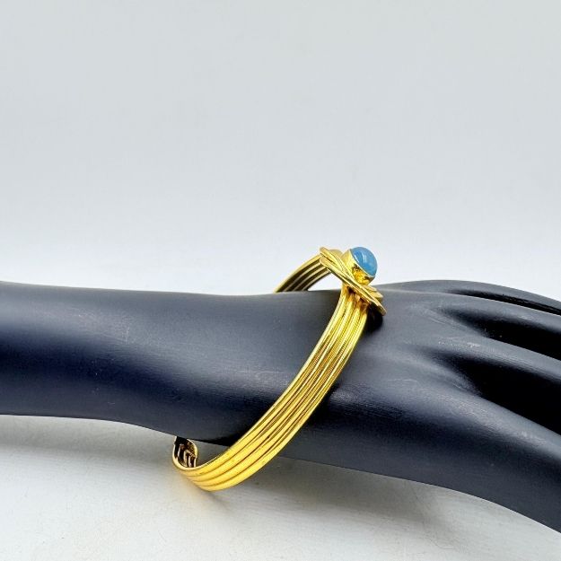 Elegant Blue Stone Knot Design Brass Bangle