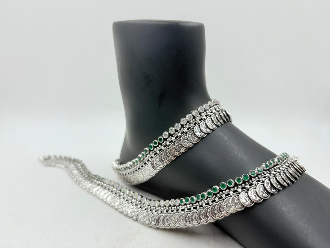 Designer Silver Anklet – Dual Layer Coin Motif with Green Stone Accents